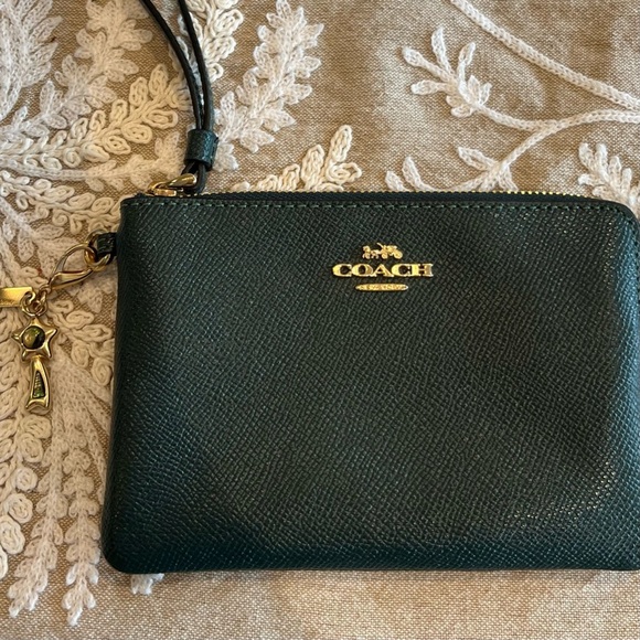 Coach Handbags - Coach Wristlet with Star Charm